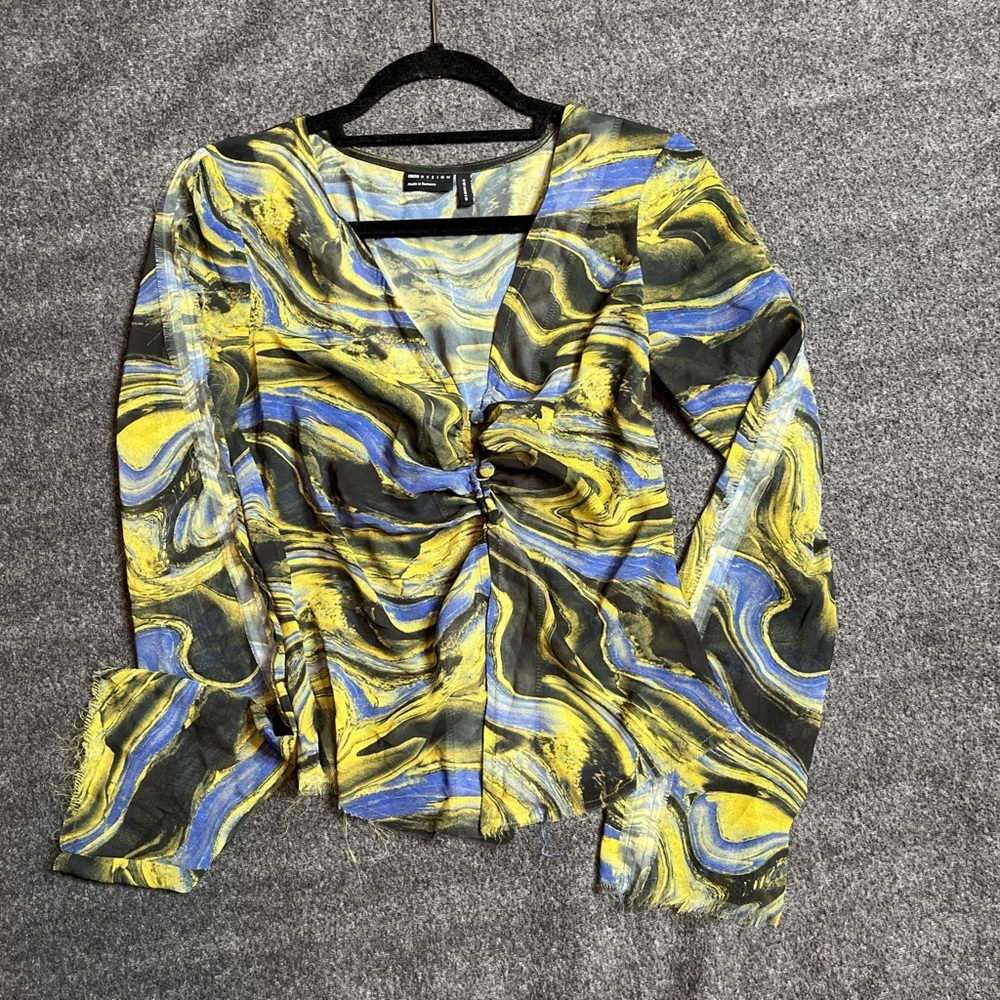 Asos Design Women’s Psychedelic Sheer Long Sleeve Festival Top.